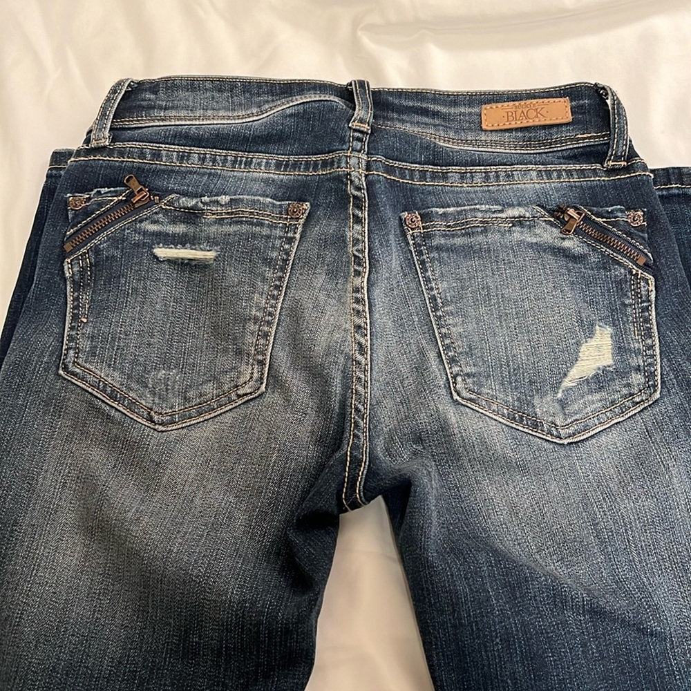 Buckle stretch jeans